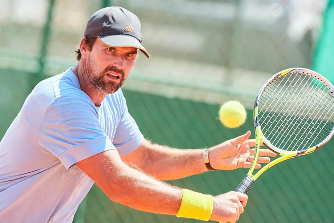 Patrick Rafter je bil eden od zadnjih igralcev s prepoznavno igro servis-volej, ki jo goji še danes. FOTO: Neven Jurjak