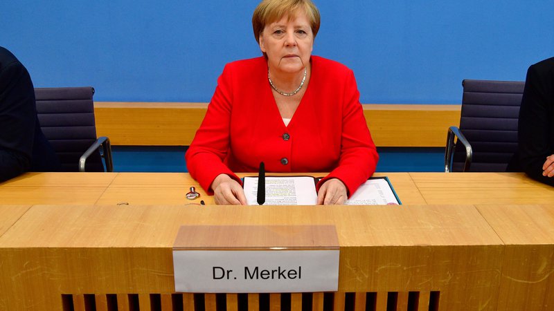 Fotografija: Angela Merkel med tradicionalno poletno novinarsko konferenco. FOTO: John MacDougall/AFP