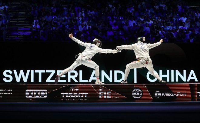 Švicarka Michele Niggerler proti Kitajki Wang Zijie. FOTO: Peter Kohalmi/AFP