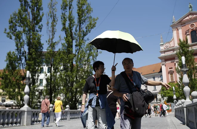 Tudi v prestolnici je vroče. FOTO: Blaž Samec/Delo