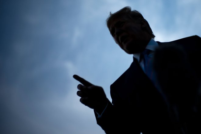 Trump je za zaplet znova obtožil medije. FOTO: Brendan Smialowski/AFP
