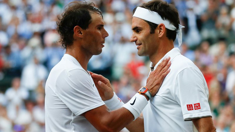 Fotografija: Na le na igrišču, tudi zunaj njega se bosta velika tekmeca Rafael Nadal in Roger Federer potegovala za dobrobit igralcev. FOTO: AFP