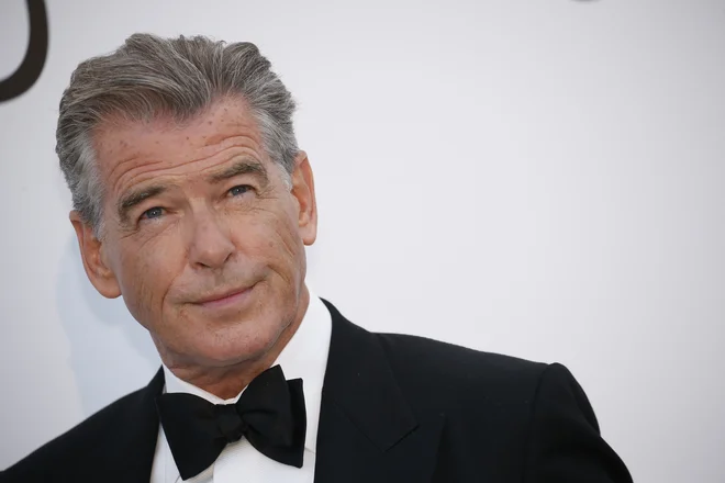 Tako Brosnan kot njegovi oboževalci so si oddahnili, ko mu ni bilo treba več prepevati. FOTO: Reuters
