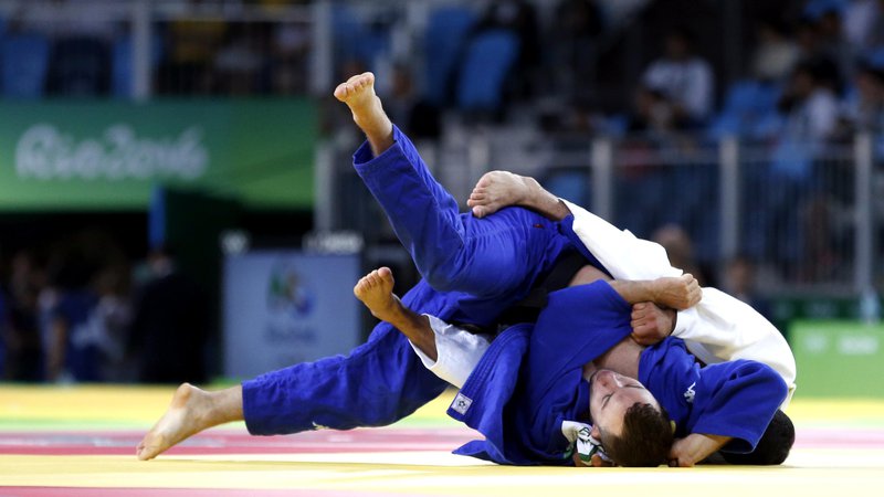 Fotografija: Adrian Gomboc (v modrem kimonu) se je od svetovnega prvenstva v Tokiu poslovil v šestnajstini finala. FOTO: Matej Družnik