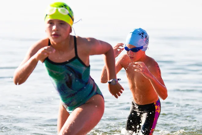 Triatlon je za otroke human šport, saj so razdalje prilagojene njihovi starosti, poleg tega je na tekmovanjih vsak do 10. leta nagrajen z medaljo, kar jim izredno veliko pomeni. Foto: P. Donahue