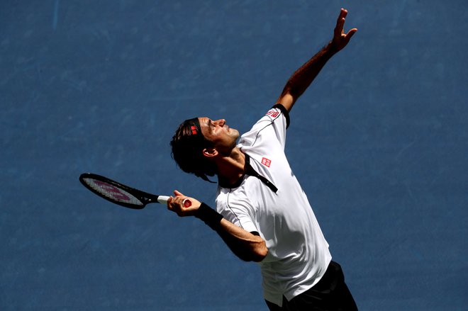 Roger Federer se je gladko uvrstil v četrtfinale. FOTO: AFP