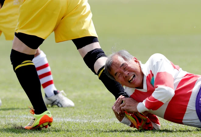 Kljub starosti veterani ne popuščajo, ko gre na tekmah zares. FOTO: Kim Kyung-hoon/REUTERS