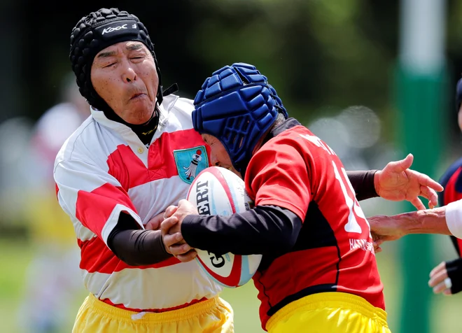 Utrinek iz tekme ragbi veteranov. FOTO: Kim Kyung-hoon/REUTERS