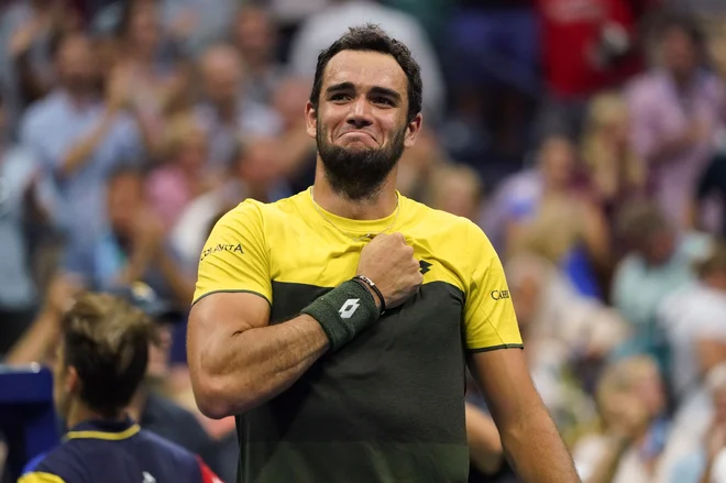 Italijan Matteo Berrettini je največje preenečenje moškega dela turnirja. FOTO: AFP