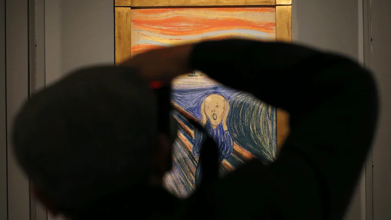 Fotografija: Zdi se, da je Edvard Munch s Krikom, s tem dolgim, neutolažljivim in tako neslišno glasnim izrazom strahu napovedal 20. stoletje. FOTO: Mike Segar/Reuters