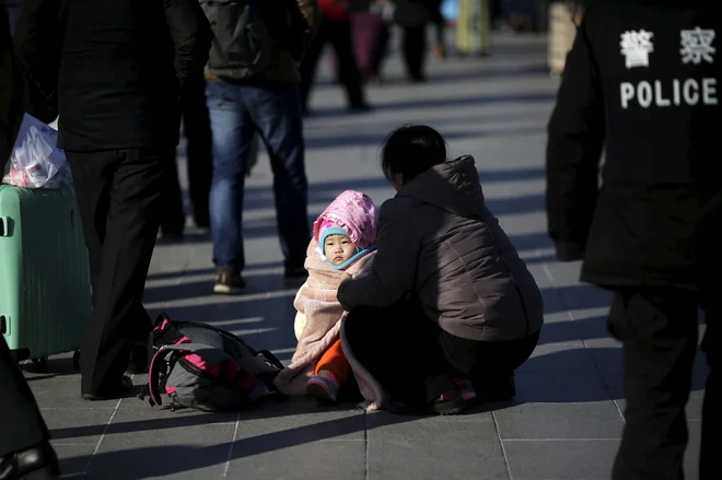 Le ugibati je mogoče, koliko otrok vsako leto izgine na Kitajskem. Ocene se gibljejo od 20.000 do 70.000. FOTO: Reuters