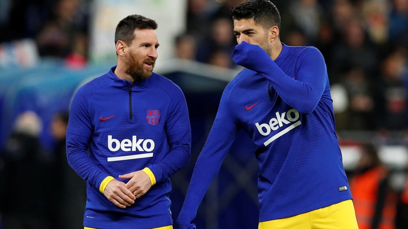 Fotografija: Lionel Messi in Luis Suarez sta velika prijatelja. FOTO: Albert Gea/Reuters