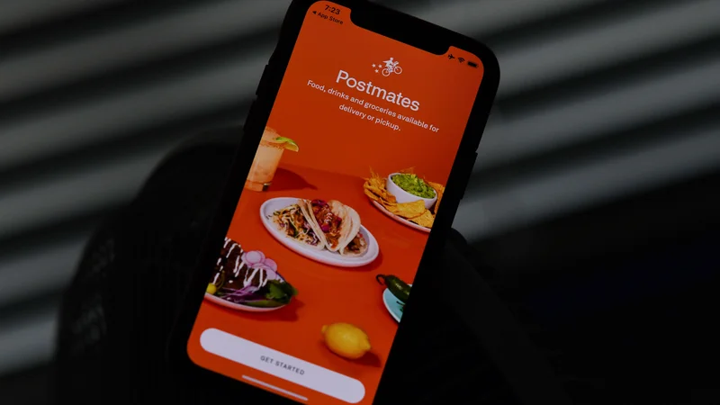 Fotografija: Uber bo za Postmates plačal 2,65 milijarde dolarjev. FOTO: Chris Delmas/AFP