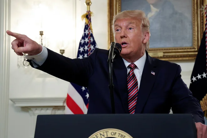 Tudi poteze Donalda Trumpa pomembno vplivajo na razpoloženje na finančnih trgih. FOTO: Jonathan Ernst/Reuters