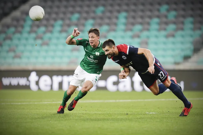 Andres Vombergar (levo) je dobil priložnost od prve minute. FOTO: Uroš Hočevar/Delo