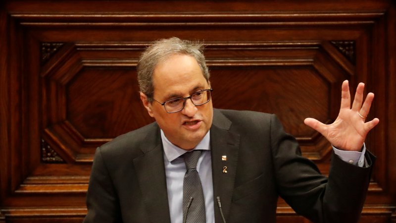 Fotografija: Predsednik katalonske vlade je včeraj sporočil, da bo neposlušen še naprej. Foto Nacho Doce/Reuters
