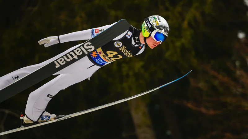 Fotografija: Anže Lanišek je priskakal Sloveniji sedmo kvoto za nastope v svetovnem pokalu. FOTO: Sascha Schuermann/AFP