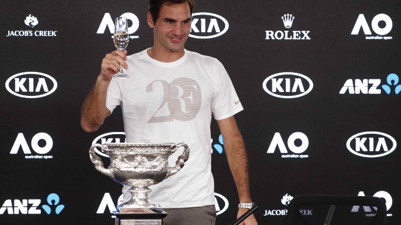 Fotografija: Morda je največje presenečenje lestvice prav na vrhu, kjer je teniški igralec Roger Federer. FOTO: Edgar Su/Reuters