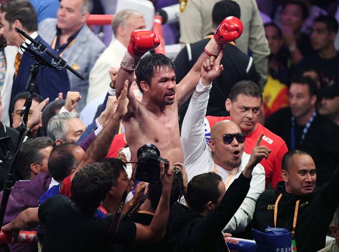 Manny Pacquiao je na Filipin izjemno priljubljen in je uspešen politik ter še aktiven boksar. FOTO: Ethan Miller/AFP