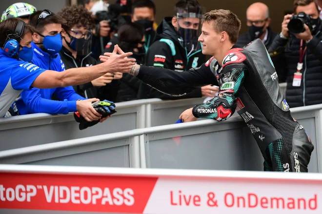 Francoz Fabio Quartararo se je veselil zmage za VN Katalonije. FOTO: Lluis Gene/AFP