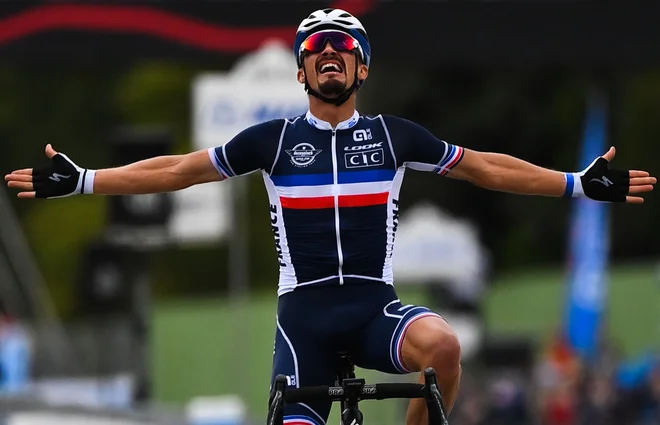 Novi svetovni prvak je Julian Alaphilippe. FOTO: Marco Bertorello/AFP