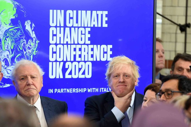 David Attenborough skupaj s predsednikom britanske vlade Borisom Johnsonom na februarski konferenci o podnebnih spremembah. FOTO: Pool New/Reuters