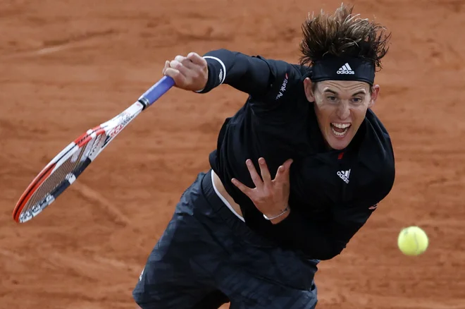 Dominic Thiem je vrhunsko formo potrdil tudi proti Hrvatu Marinu Čiliću. FOTO: Christian Hartmann/Reuters