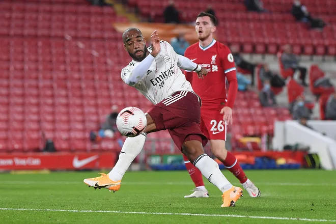 Alexandre Lacazette je prvi zatresel mrežo na Anfieldu. FOTO: Laurence Griffiths/AFP