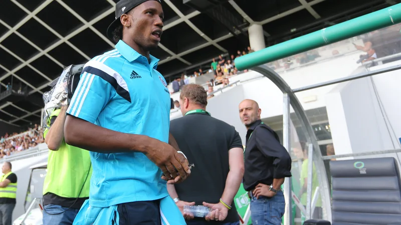 Fotografija: Didier Drogba je poleti leta 2014 obiskal tudi štadion Stožice med prijateljsko tekmo Olimpije in Chelseaja. FOTO: Igor Zaplatil