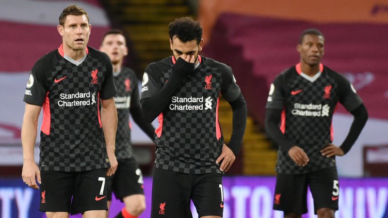 Fotografija: Liverpoolovim igralcem ni bilo jasno, kaj se jim je zgodilo na Villa Parku. FOTO: Rui Vieira/Reuters