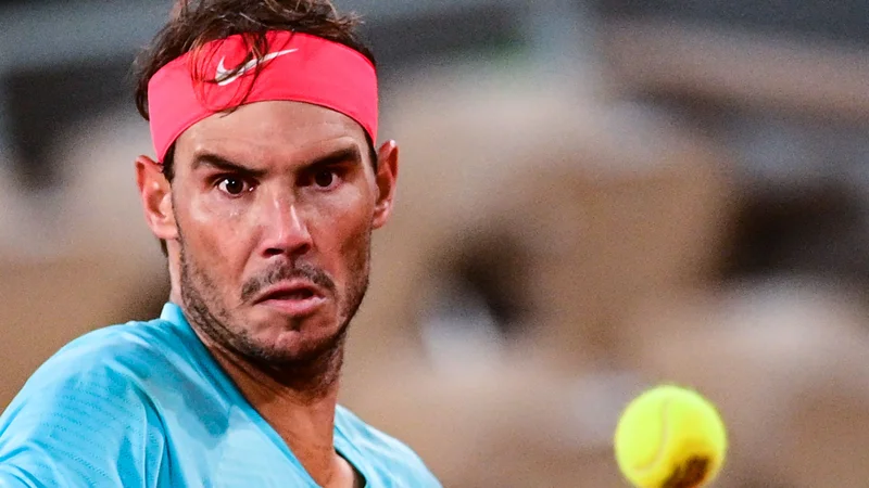 Fotografija: Rafael Nadal je na 100. dvoboju na pariškem pesku vpisal 98. zmago. FOTO: Martin Bureau/AFP