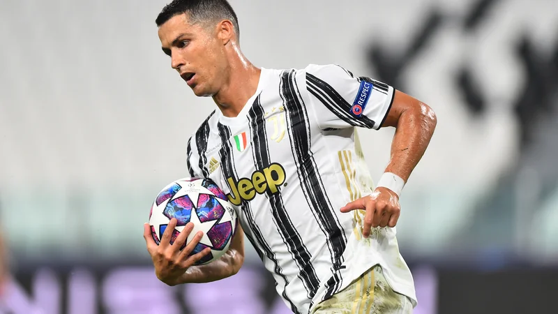 Fotografija: Cristiano Ronaldo je udarni zvezdnik tako Juventusa kot tudi portugalske reprezentance. FOTO: Massimo Pinca/Reuters