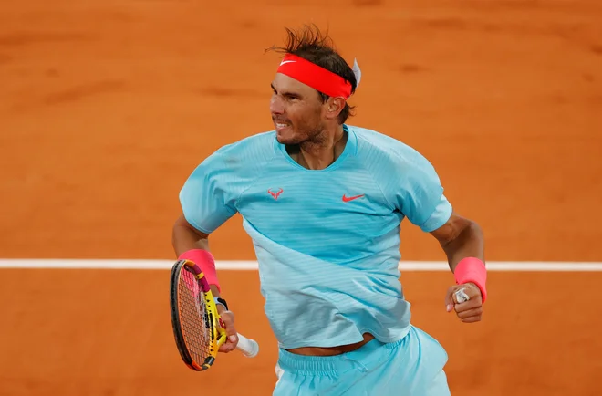 Rafael Nadal se je sredi noči razveselil uvrstitve v polfinale.<br />
FOTO: Gonzalo Fuentes/Reuters