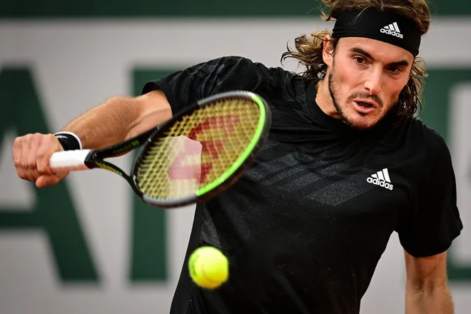 Najboljši slovenski teniški igralec Aljaž Beden pravi, da bi Stefanos Tsitsipas lahko Novaku Đokoviću odvzel največ en niz. FOTO: Martin Bureau/AFP
