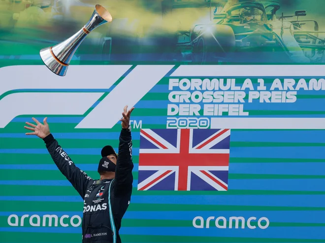 Britanski voznik formule Lewis Hamilton 1 je izenačil tudi rekord Michaela Schumacherja. FOTO: Ronald Wittek/AFP