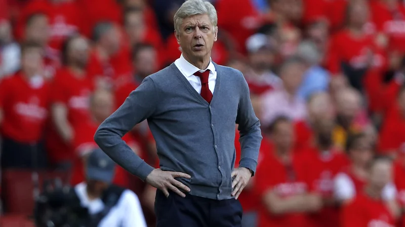 Fotografija: Arsene Wenger zdaj dela za Mednarodno nogometno zvezo na področju globalnega razvoja panoge. FOTO: Adrian Dennis/AFP