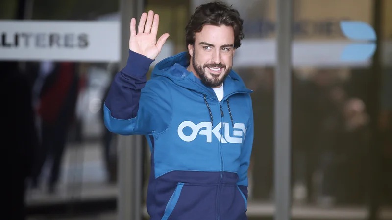 Fotografija: Fernando Alonso je pred 15 leti prvič osvojil naslov svetovnega prvaka v formuli 1. FOTO: Albert Gea/Reuters