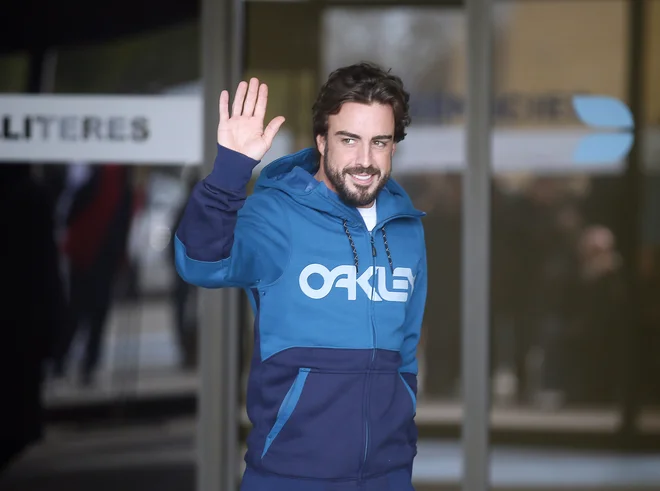 Fernando Alonso je pred 15 leti prvič osvojil naslov svetovnega prvaka v formuli 1. FOTO: Albert Gea/Reuters