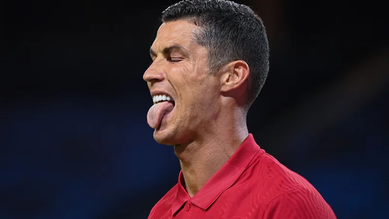 Fotografija: Moderna kuga se je dotaknila tudi nogometnega boga Cristiana Ronalda. FOTO: Jonathan Nackstrand/AFP