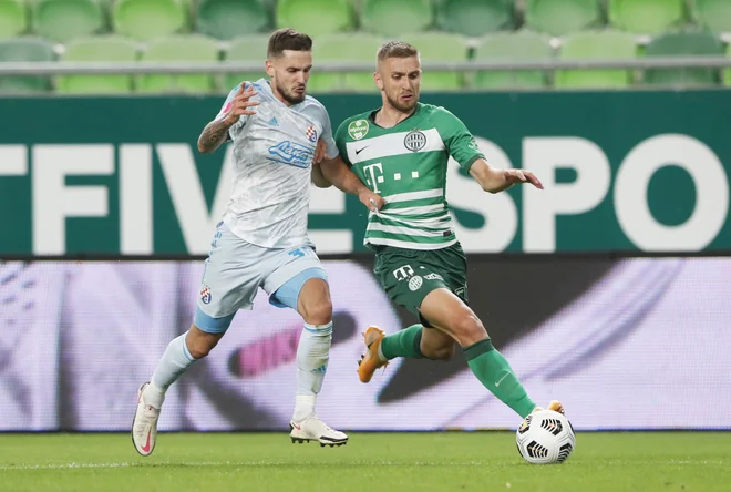 Petar Stojanović (levo) bo z zagrebškim Dinamom poskušal streti odpor Feyenoorda. FOTO: Bernadett Szabo/AFP