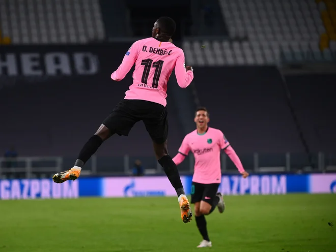 Francoski napadalec Ousmane Dembele je odločil gostovanje Barcelone v Torinu na podajo Lionela Messija. FOTO: Marco Bertorello/AFP