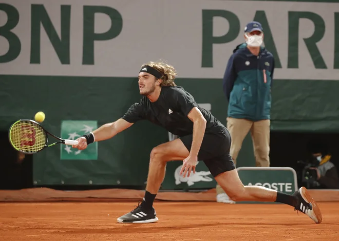 Stefanos Tsitsipas je nazadnje v Parizu igral v polfinalu, v Londonu pa bo branil lovoriko lanskega zmagovalca. FOTO: Charles Platiau/Reuters