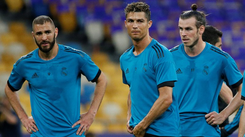 Fotografija: (Nekdanji) Realovi asi Karim Benzema, Cristiano Ronaldo in Gareth Bale na večer 25. maja 2018 v finalu lige prvakov v Kijevu. FOTO: Gleb Garanich/Reuters
