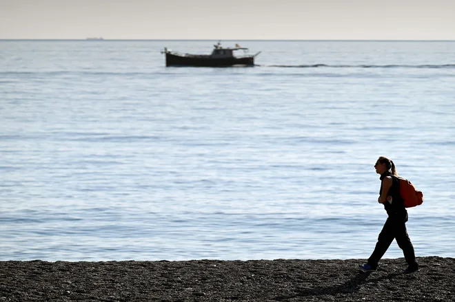 Dvajset italijanskih dežel je razdeljenih na rdeča, oranžna in rumena območja. FOTO: Vincenzo Pinto/AFP