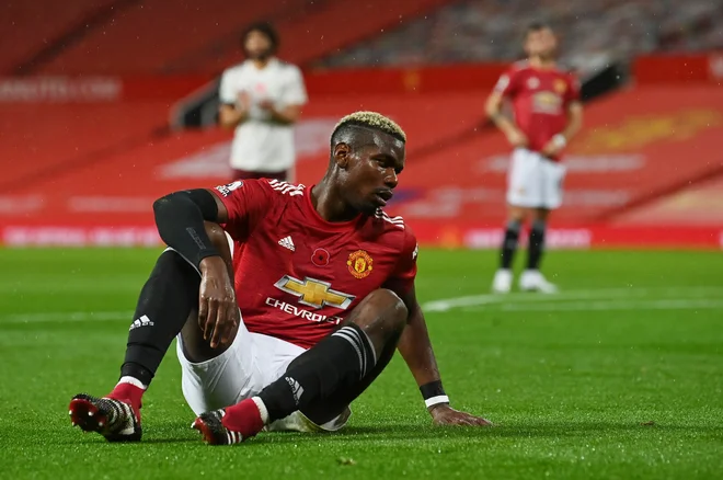 Paul Pogba je ob prestopu iz Juventusa v Manchester United prinesel kar za 49 milijonov evrov provizij. FOTO: Paul Ellis/Reuters