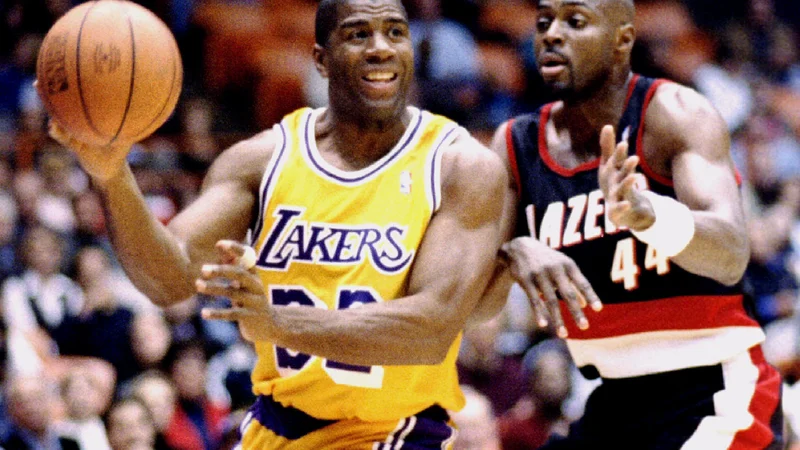 Fotografija: Magic Johnson je eden od največjih zvezdnikov v zgodovini košarke, a je moral predčasno končati kariero. FOTO: Sam Mircovich/Reuters