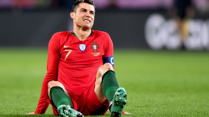 Fotografija: Velezvezdnik Cristiano Ronaldo bo s portugalskimi soigralci naslednji teden gostoval v Splitu. FOTO: Fabrice Coffrini/AFP