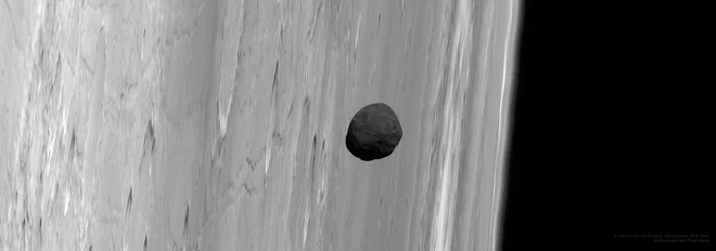 Mali satelit Fobos Mars obkroži v slabih osmih urah, znanstveniki pa so izračunali, da bo nekoč padel na njegovo površje. G. Neukum (FU Berlin), Mars Express, DLR, ESA, Peter Masek