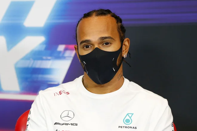 Lewis Hamilton: Odlično je, da lahko z dirkanjem opozorimo na probleme zaradi podnebnih sprememb. FOTO: Antonin Vincent/AFP