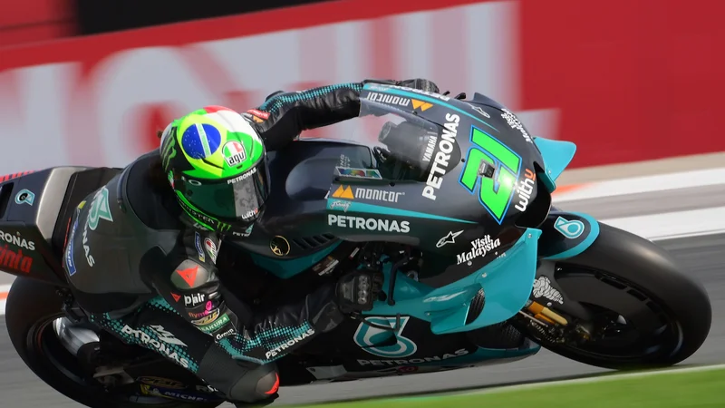 Fotografija: Franco Morbidelli si je Valencii pridirkal drugi pole position v karieri v motoGP. FOTO: Lluis Gene/AFP